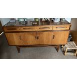 A G-Plan teak sideboard with 4 drawers and 4 doors. 150cm w x 46 d x 85cm h.Condition ReportGood