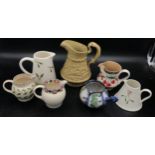 Collection of seven jugs to include a W Ridgeway relief moulded jug of Tam O'Shanter with