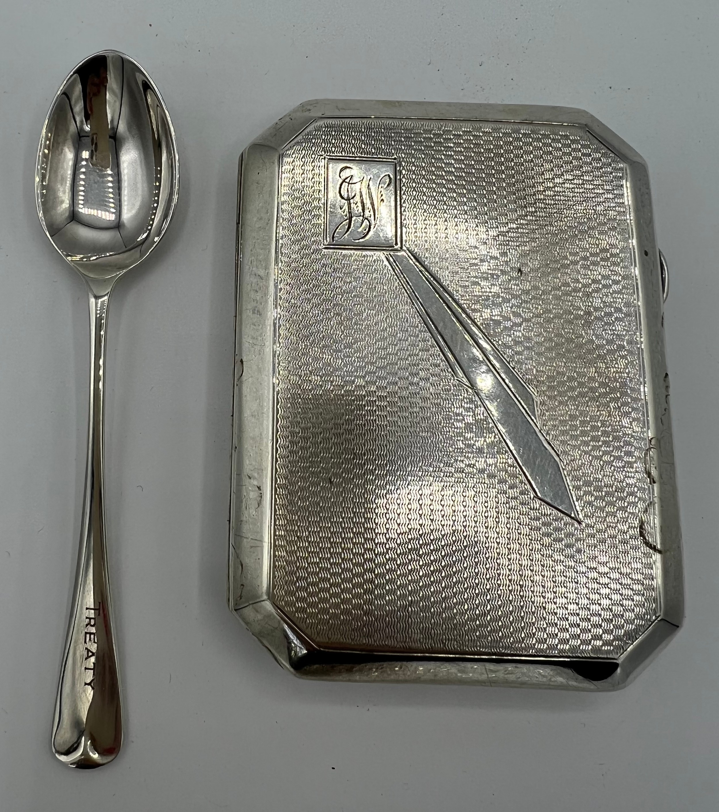 Silver Art Deco cigarette case Birmingham 1932 together with a Holderness Hunt silver spoon engraved