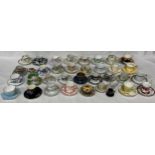 A large collection of cups and saucers to include Court China, The Royal collection, Paragon,