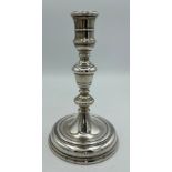 Single silver weighted candlestick 19cm h London 1973.