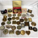 A collection of ladies compacts some in original box makes including sixteen Stratton, KIGU of