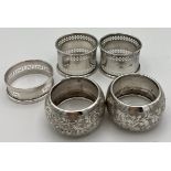 Five hallmarked silver napkin rings, various dates and makers. Total weight 90gm.