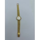 An Omega De Ville 18 carat yellow gold ladies wristwatch. De Ville logo to back and serial number