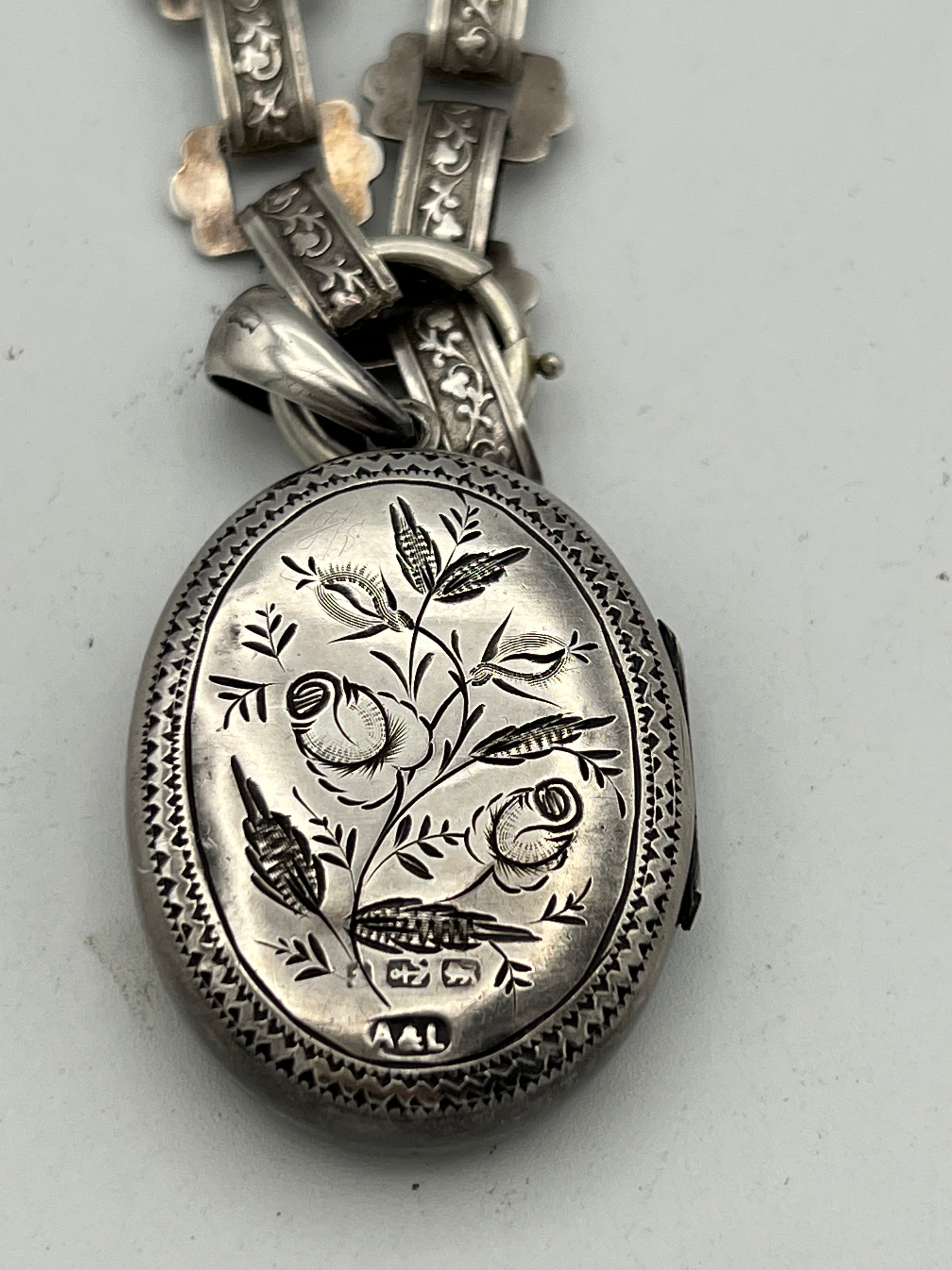 Victorian silver locket on white metal chain. Birmingham 1883. Maker Adie and Lovekin. Total - Image 2 of 3