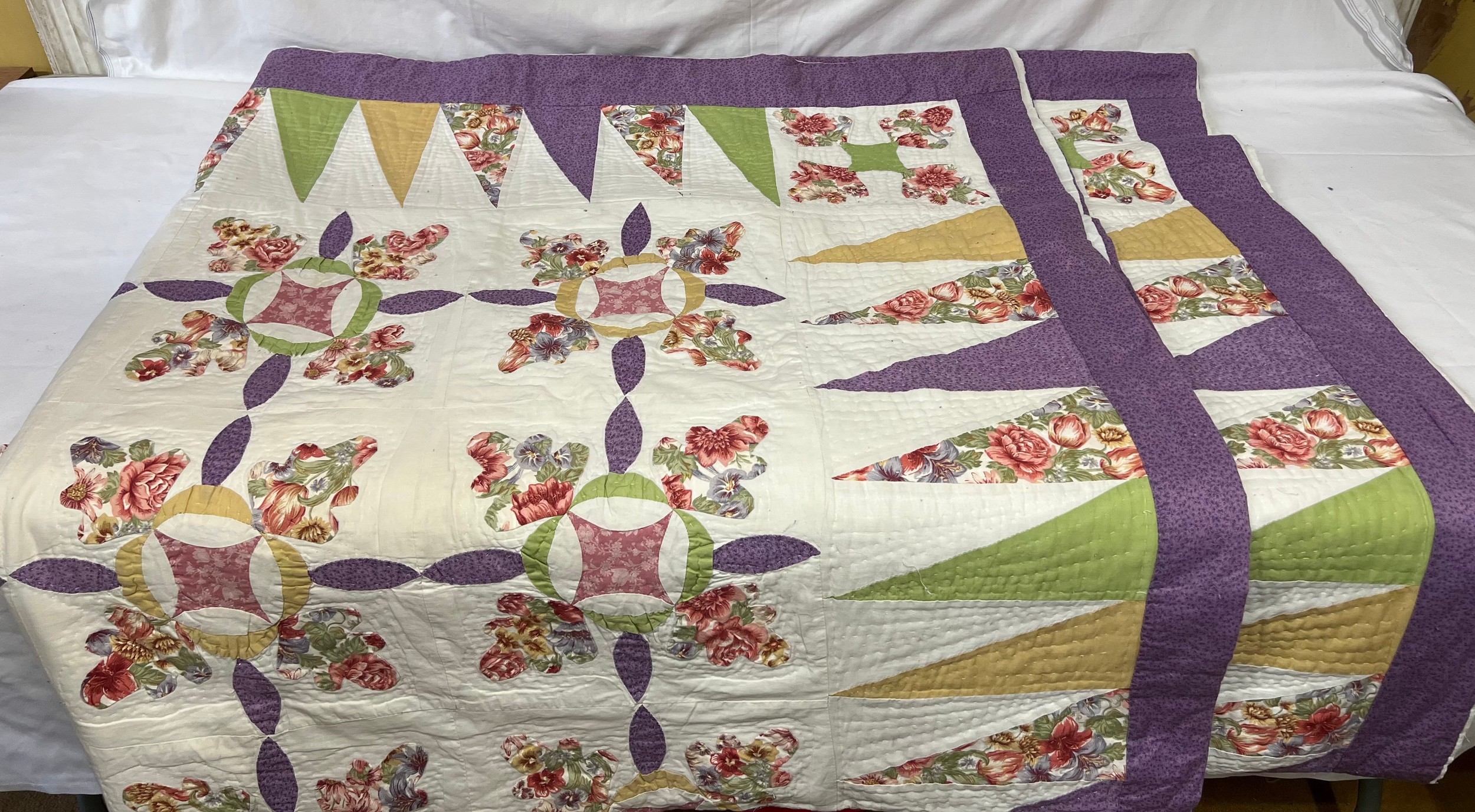 A handmade patchwork quilt. Approx 470 l x 430 w. - Image 2 of 7