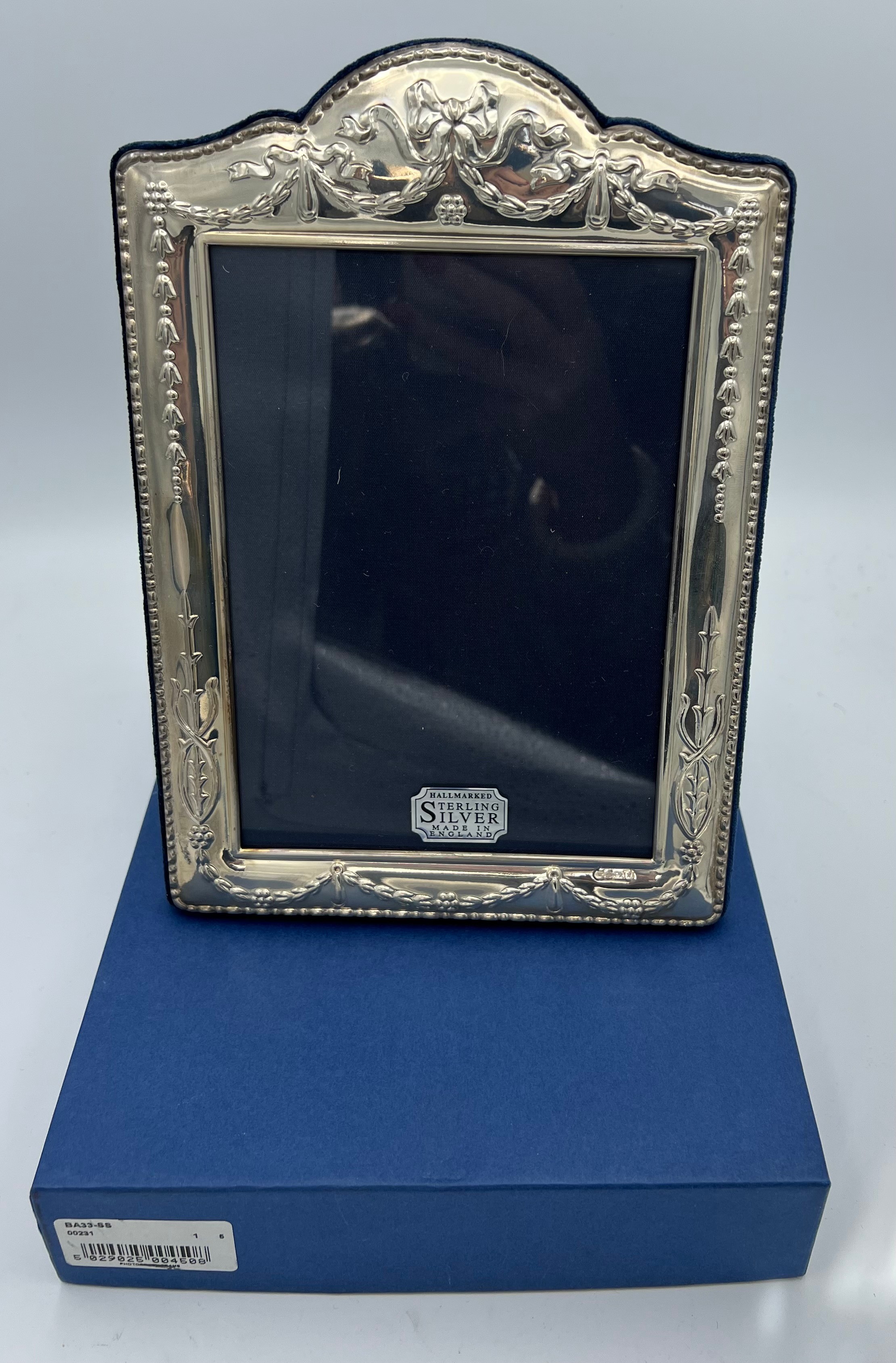 Silver photograph frame, Sheffield 1997 unused in original box 24 x 16.5cm.