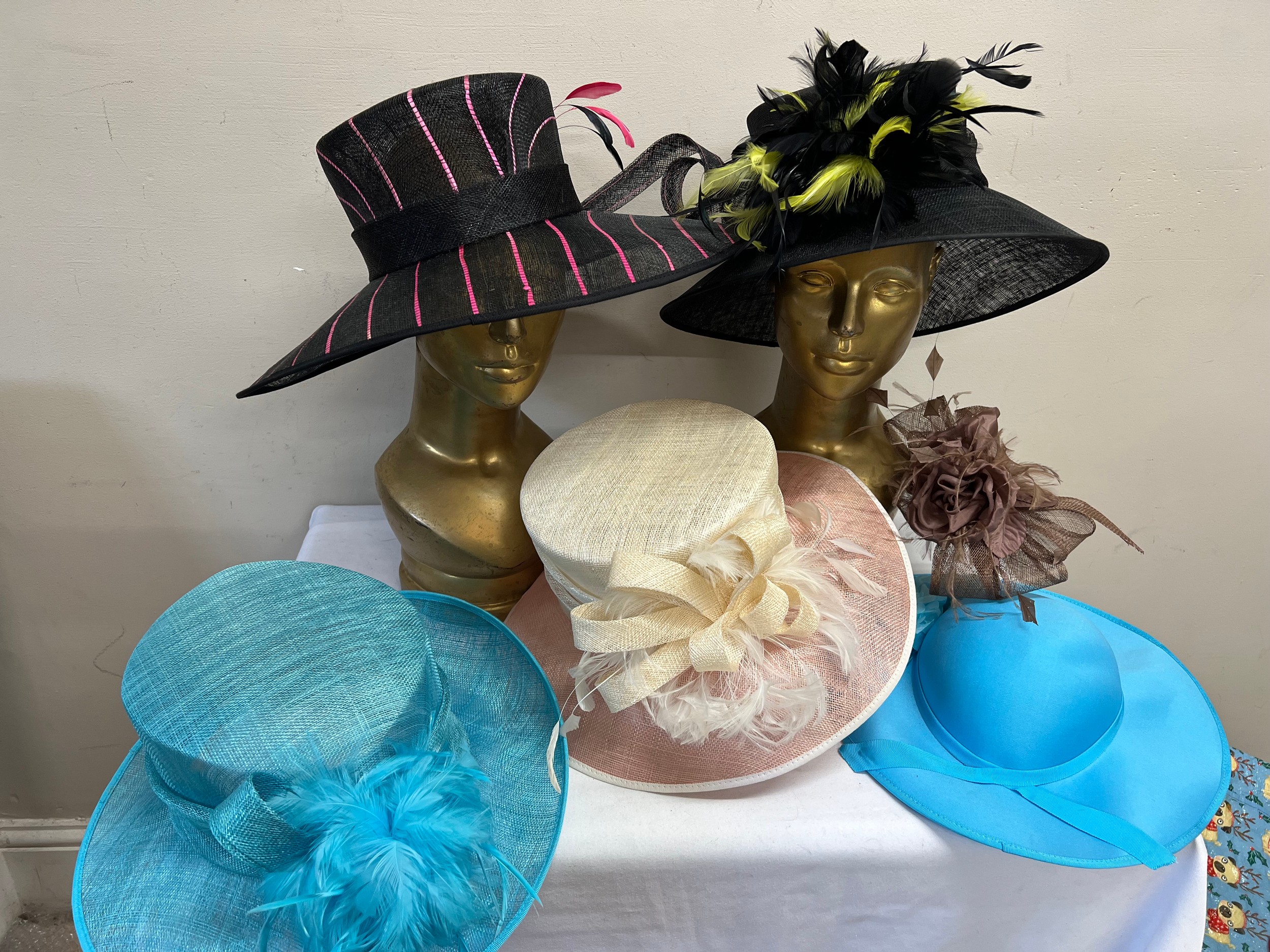 Five various hats and a fascinator including Viyella.