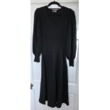 A size medium Mary Quant black wool dress measuring 123cm from shoulder to hem.
