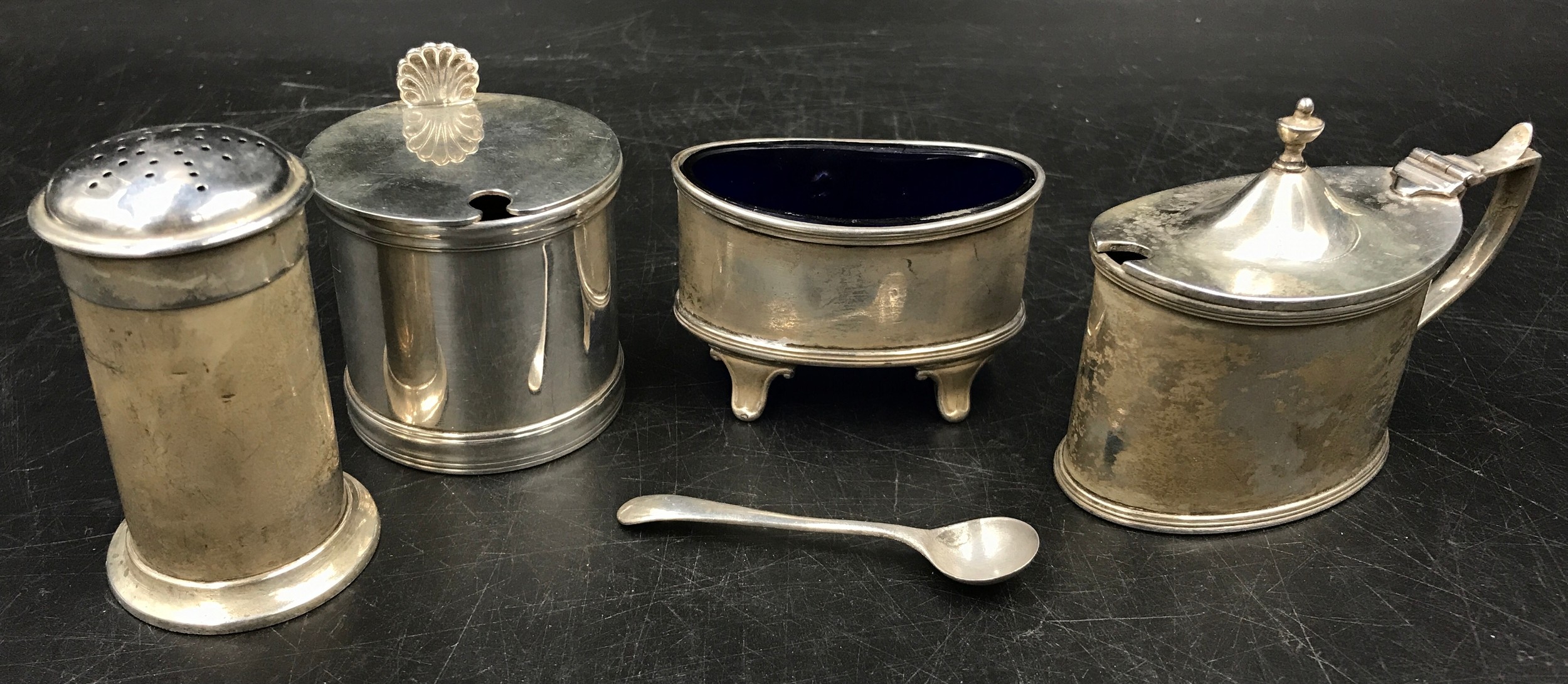 A collection of 5 silver items to include round mustard pot marked London 1920 Edward Barnard & Sons