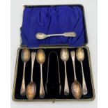 Boxed silver teaspoons and tongs Chester 1918, maker Barker brothers, together with a mustard spoon,