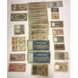 A collection of world banknotes 37 in total to include India: 1 Rupee liaquat jung, 1 rupee note