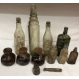 A collection of glass bottles to include three 16oz Bovril, Gordon's special dry London gin and an