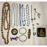 A collection of costume jewellery to include a heavy stone bead necklace, five other necklaces, four