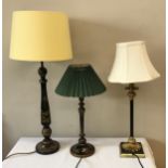 Three table lamps tallest 73cm, two black and gilt lacquered lamp bases Oriental design, the other