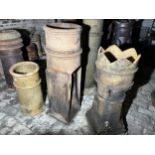 Three Chimney Pots tallest 107cm h includes one crown top