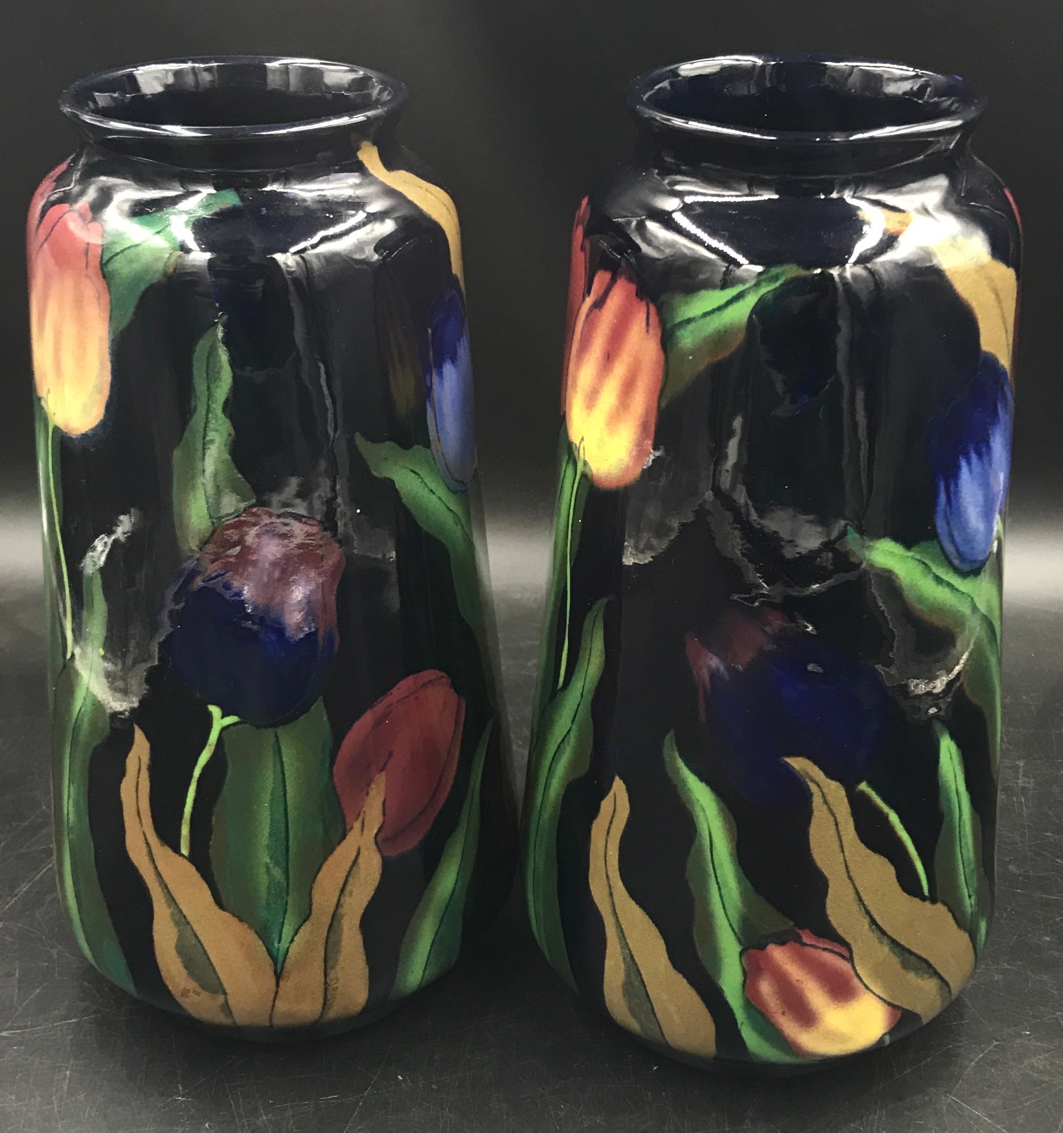 A pair of Royal Stanleyware 'Jacobean' tall vases decorated with tulips on a dark blue ground, 30. - Image 2 of 3