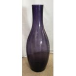 Tall purple glass vase 60cm h with fluted sides.