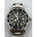 A Rolex Sea-Dweller Submariner 2000 - Double Red - Reference: 1665 from 1978. The dial