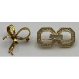 A nine carat gold brooch in the form of a bow set with single diamond and a vintage Christian Dior