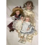 Four bisque headed dolls to include an Alt Beck & Gottschalck with a cropped brown wig, sleeping