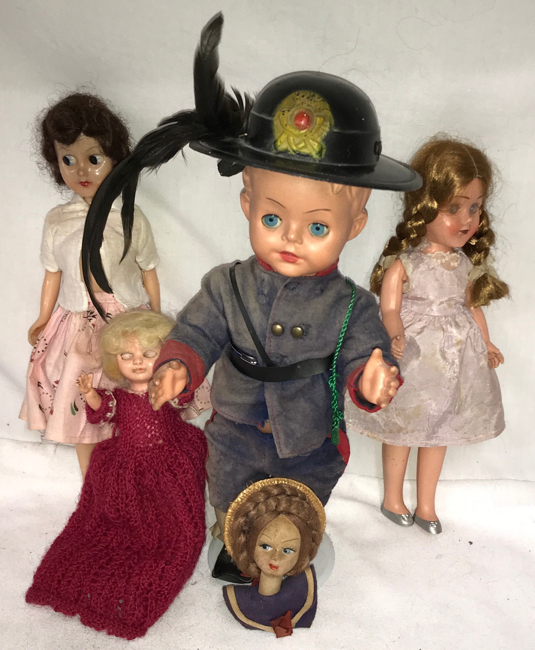 Various celluloid dolls to include a Roddy doll 27cm h, Rosebud, a boy doll in uniform and hat on