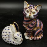 Two Royal Crown Derby animal paperweights a cat 14cm h and a rabbit 8cm h both with gold stoppers.