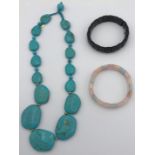 Three items of Lola Rose Jewellery 2 bracelets one pink, one black and a turquoise beaded necklace