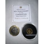 A Commonwealth Games 2002 two pound coin with Queen Elizabeth II 60th Anniversary of the