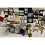 A quantity of costume jewellery to include brooches, watches, rings, pocket watch, bracelets etc.