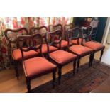 Ten mahogany balloon back dining chairs with red and gold upholstery 83cm h to back 45cm h to seat.