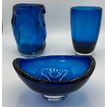 Three pieces of deep blue Whitefriars glass designed by Geoffrey Baxter. Tallest 18cm h.