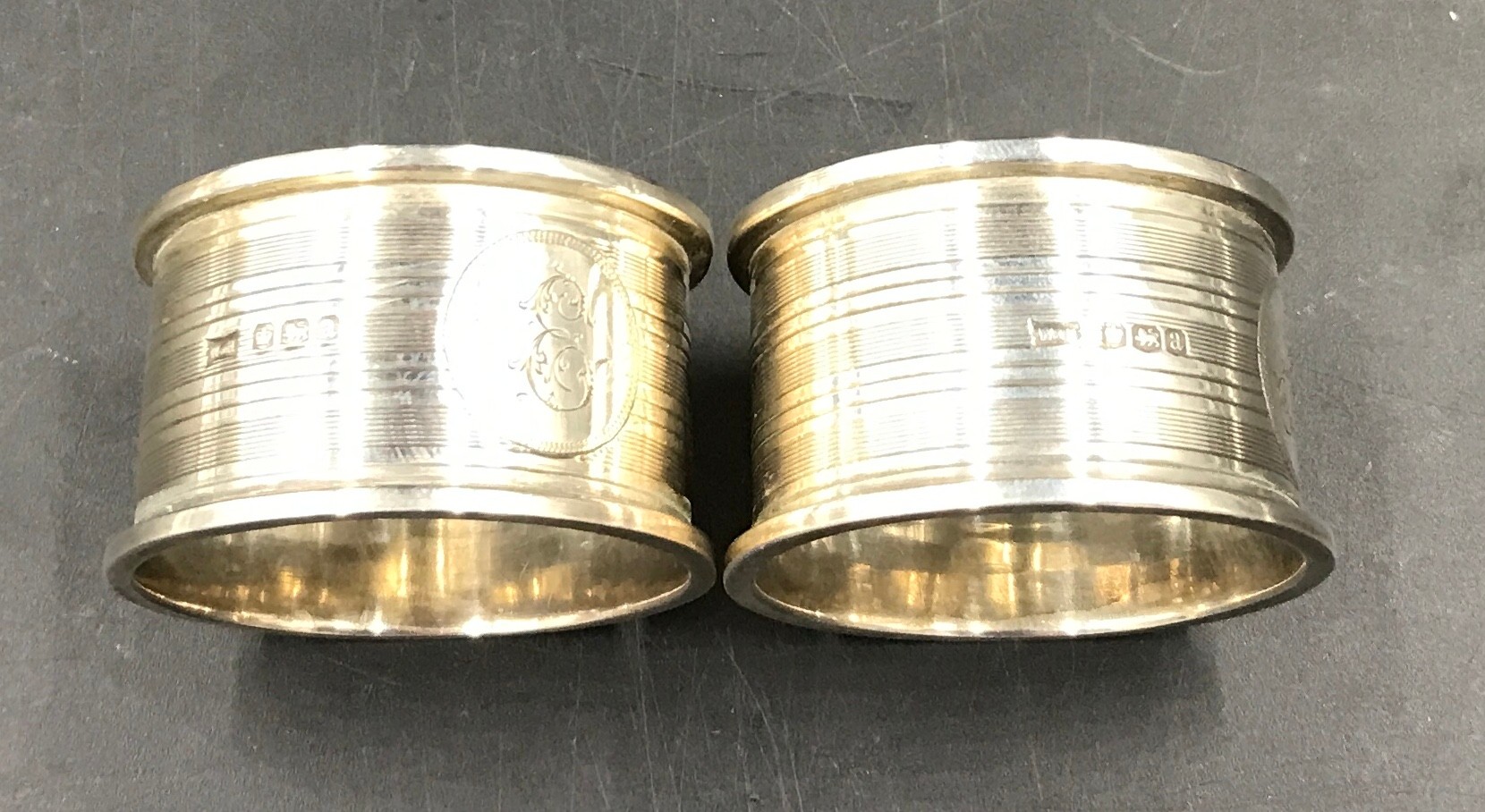 Selection of silver items to include 2 napkin rings Sheffield 1918, three salt & pepper shakers - Image 2 of 5