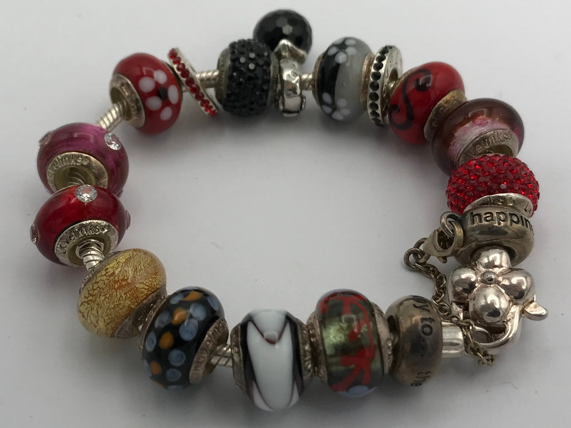 A selection of five bracelets to include two Nomination bracelets, a Pandora bracelet with 3 spare - Image 5 of 7