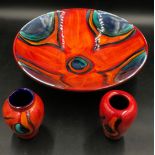 Poole pottery Volcano pattern two small vases and a large bowl 34cm diameter.