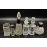 Three silver rimmed perfume bottles and three glass perfume bottles, 2 matching. One Birmingham 1919