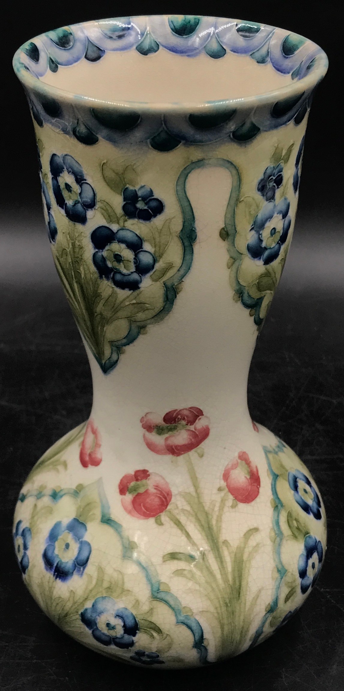 A William Moorcroft Macintyre Burslem vase with floral design 21 h and a pair of hand painted hollow - Image 4 of 8