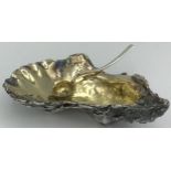 A silver oyster shaped salt, London 1998 maker indistinct together with a silver salt spoon maker