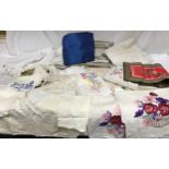 Two large boxes of various linens including damask 'huckaback' guest towels, assorted pillowcases,