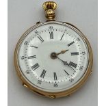 A Continental gold cased pocket watch (tests as 9ct) with white enamel dial. Weight 25.2gm.