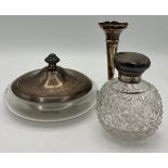 Silver topped glass scent bottle, silver topped jar and a silver specimen vase. Various dates and