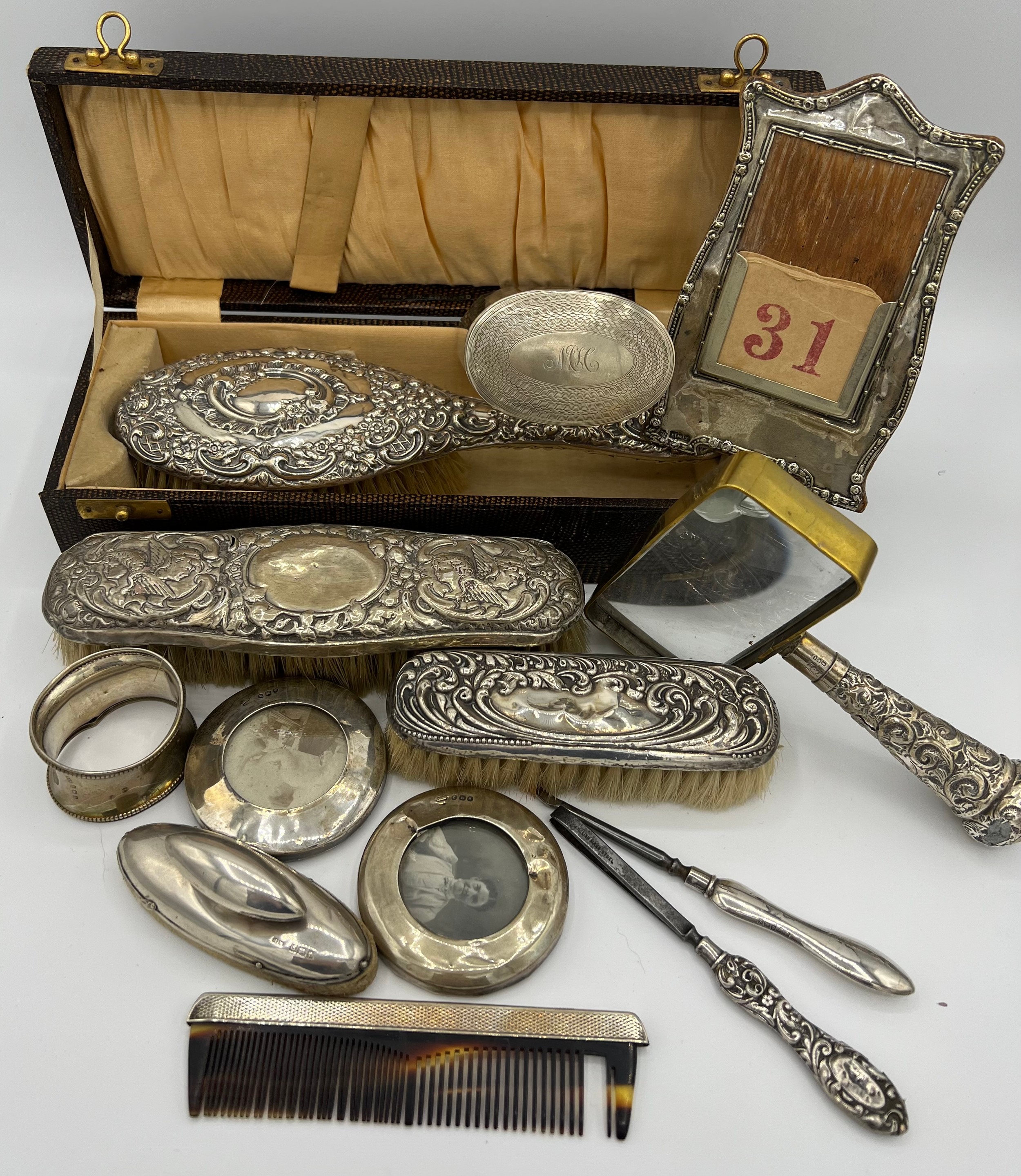 A quantity of silver to include boxed hairbrush, clothes brushes, napkin ring, nail buffer, comb, - Image 2 of 2