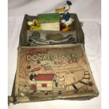 A Lionel No. 1107 Donald Duck Rail Car and track with original box.