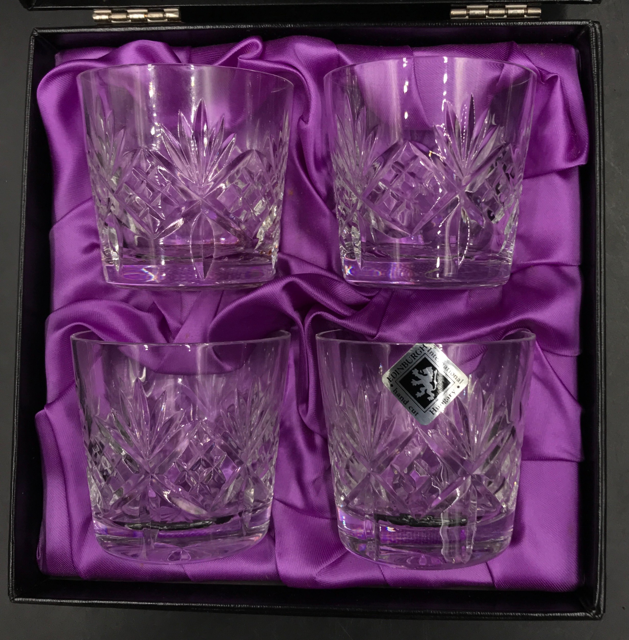 A boxed Edinburgh International hand cut set of four lead crystal glasses. - Image 2 of 6