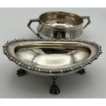 Silver to include a twin handled bowl, Birmingham 1932, makers marks rubbed and a dish raised on