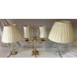 Two cut glass table lamps and one twin branch brass and glass table lamp with lustres 45cm at