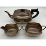 A three-piece silver tea service comprising teapot, milk and sugar, Chester 1930 maker S Blanckensee