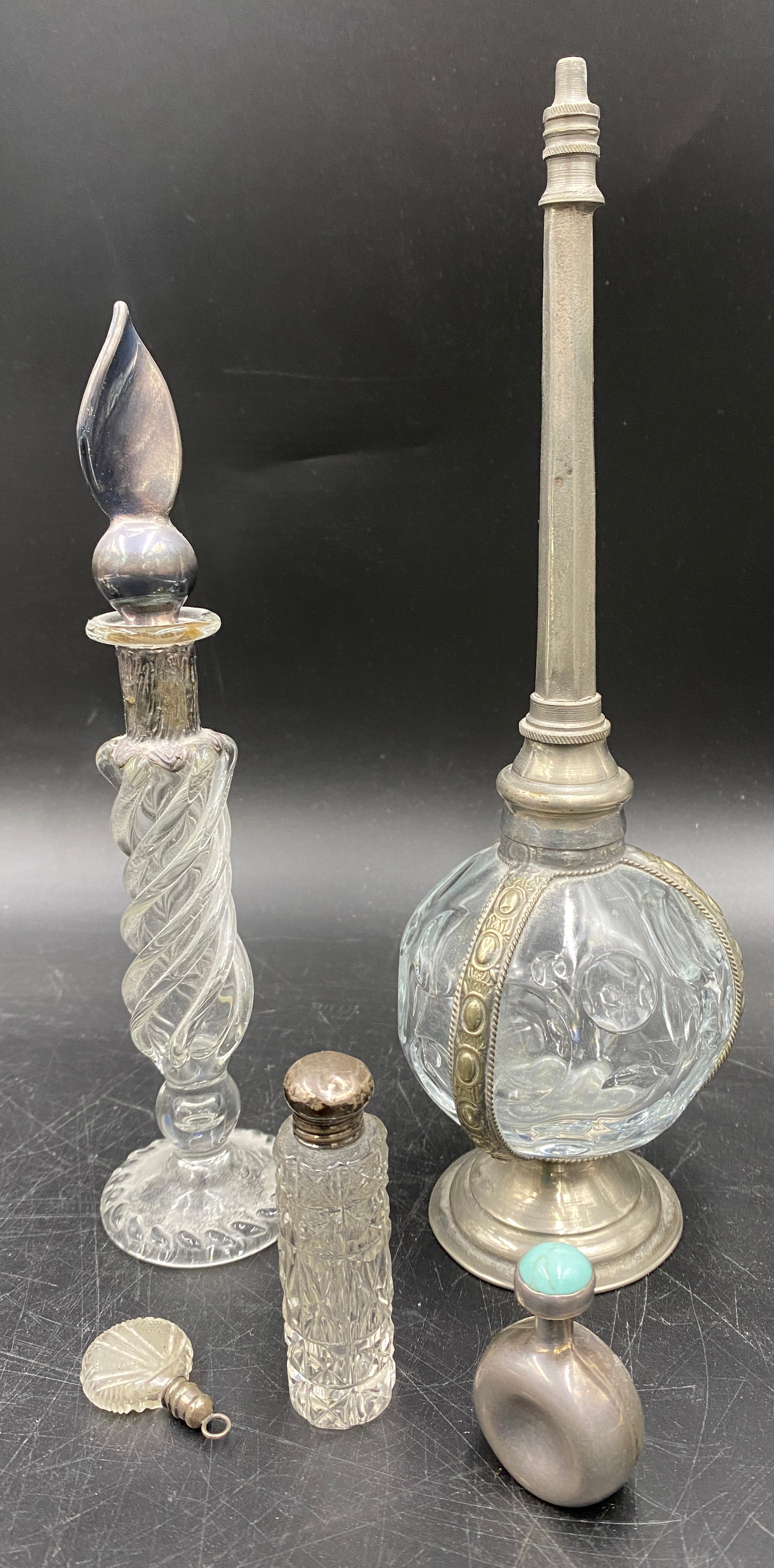 A collection of silver and glass items to include four perfume bottles, perfume pendant, perfume - Image 4 of 4