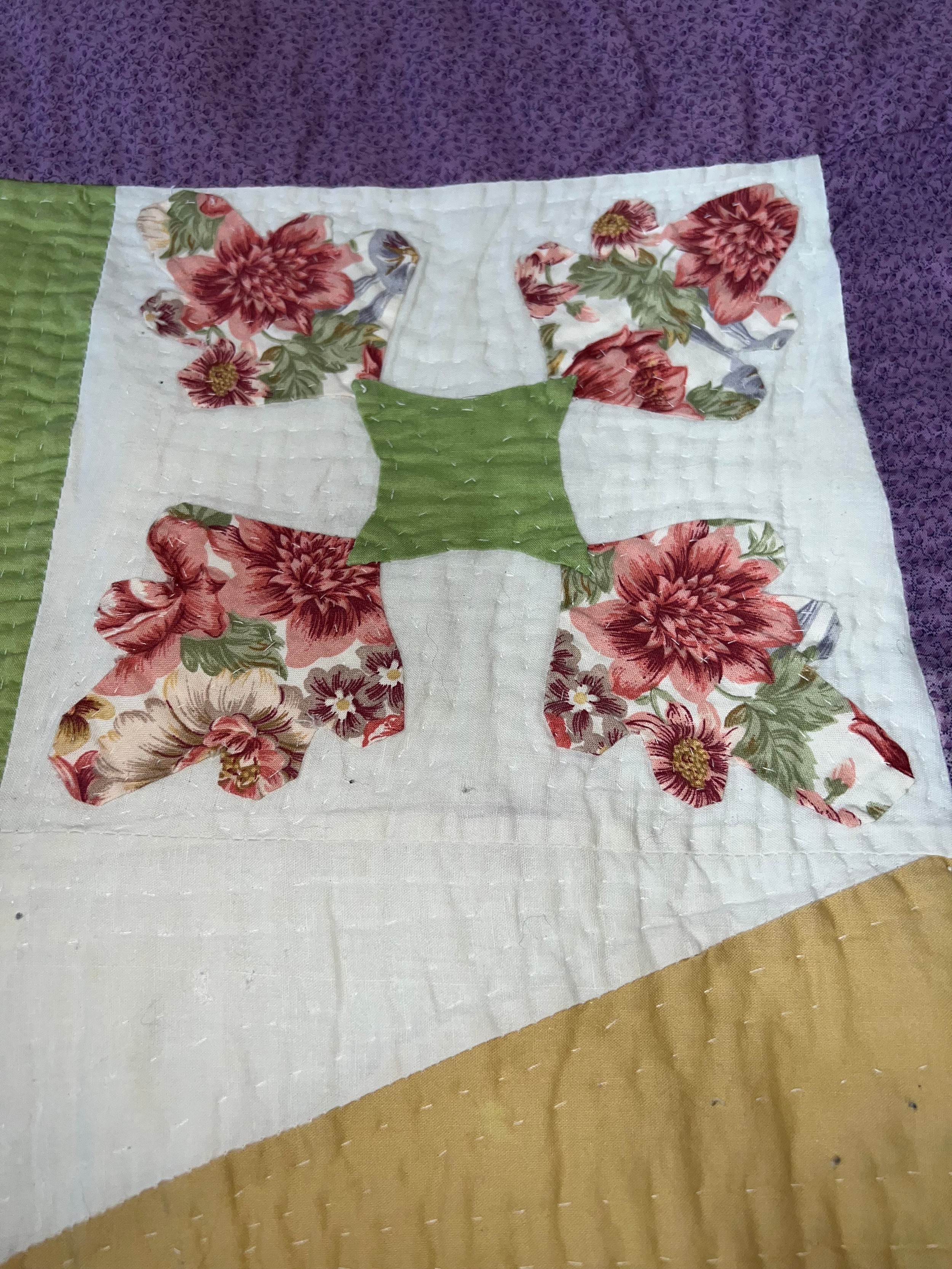 A handmade patchwork quilt. Approx 470 l x 430 w. - Image 4 of 7