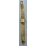 A ladies 18 carat yellow gold Omega wristwatch. Total weight 37.8gm.